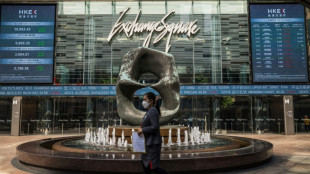 Stocks mostly fall as Trump ramps up tariff threats