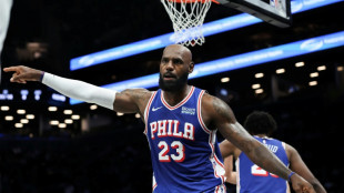 James shines in pre-season debut for re-tooled 76ers