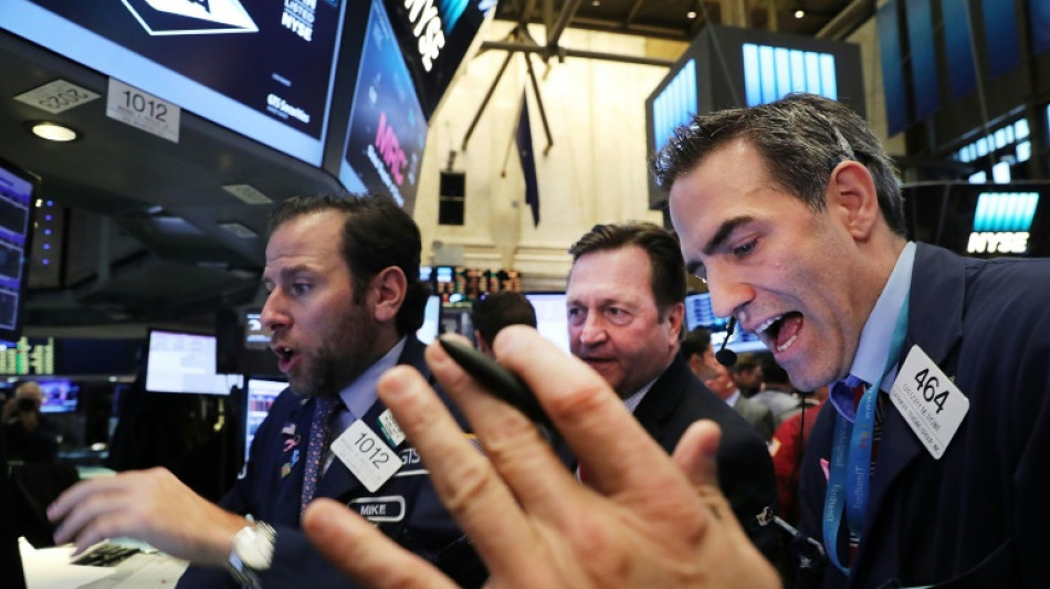 Wall Street conclut en hausse une s&eacute;ance h&eacute;sitante en attendant l'inflation