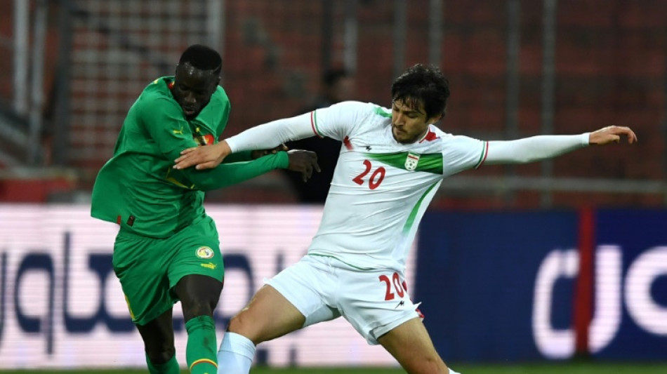 Protests shadow Iran's World Cup push