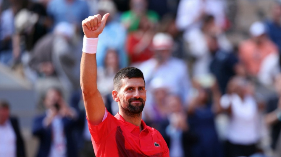 Djokovic into French Open quarters as No.361 Boisson springs upset