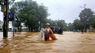 Record Vietnam rains kill seven and flood 100,000 homes