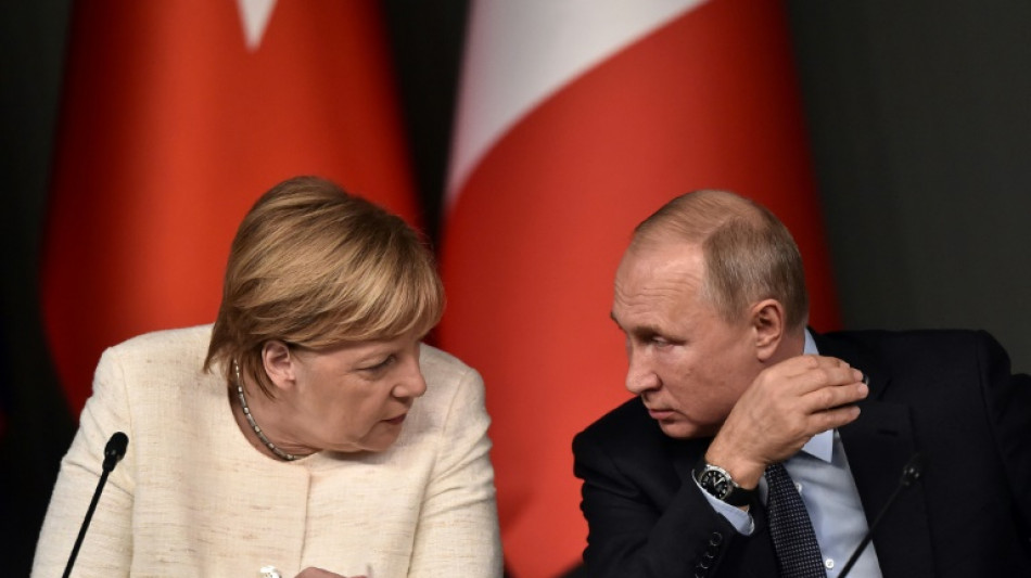 Merkel defends 2008 decision to block Ukraine from NATO