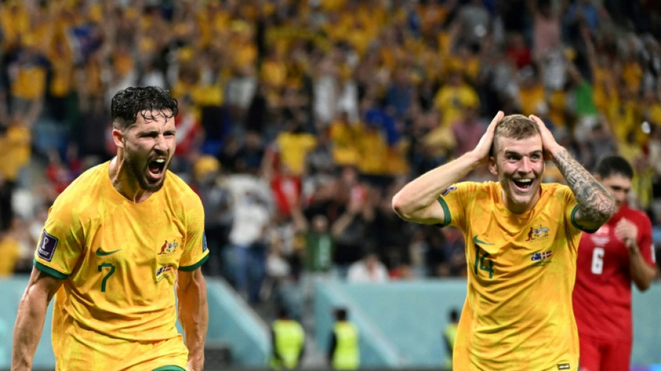 Australia reach World Cup last 16, France suffer upset