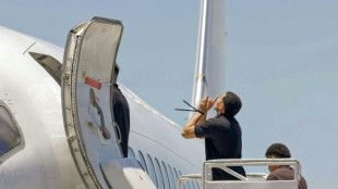 Llegan a Venezuela migrantes liberados por El Salvador tras canje con EEUU