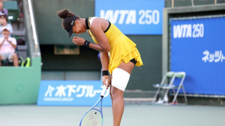 Tearful Osaka battles injury to reach Japan quarter-finals