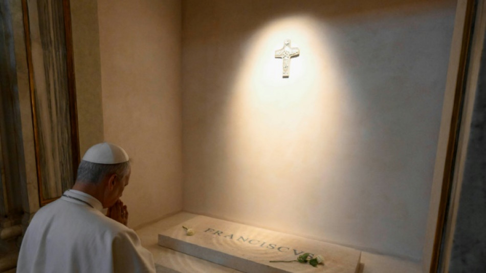 Leo XIV, new pope and 'humble servant of God', visits Francis's tomb