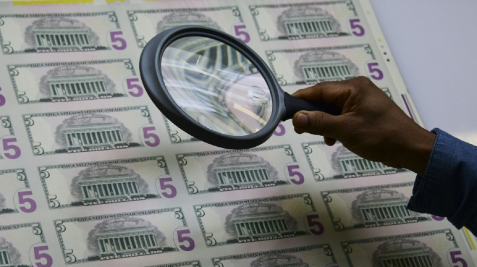 Dollar slides as Trump eyes new Fed boss