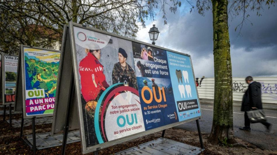 Swiss vote on compulsory civic duty, climate tax for super-rich