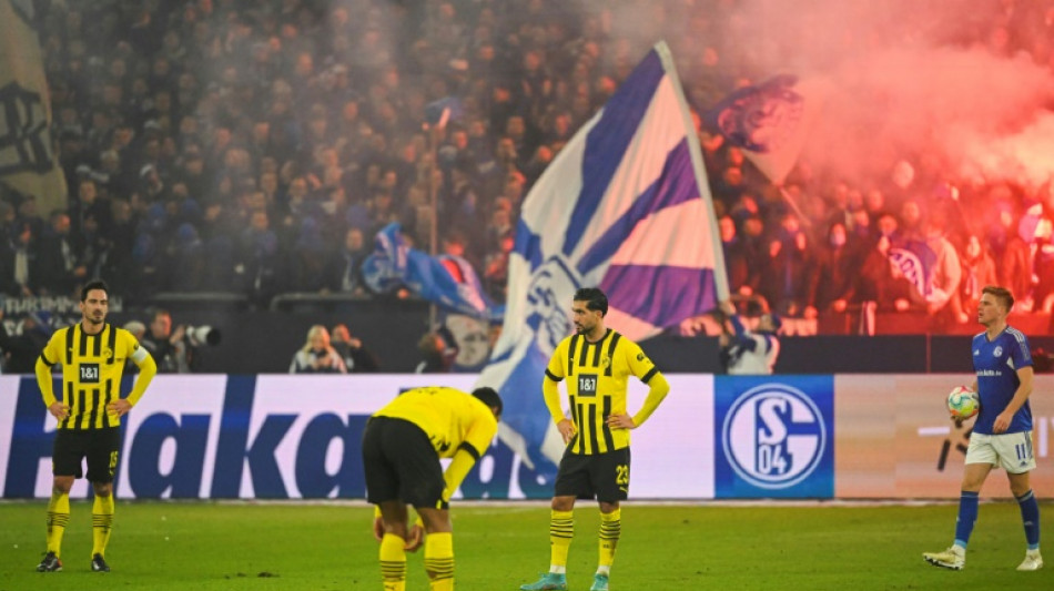 Bayern alone on top after Dortmund drop points in derby