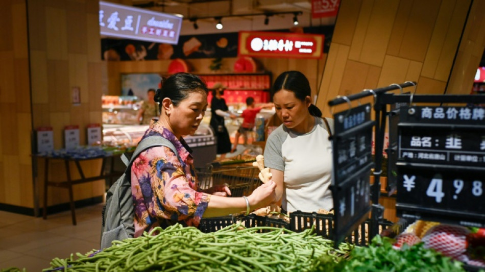 China's snaps 4-month consumer decline but factory price deflation deepens