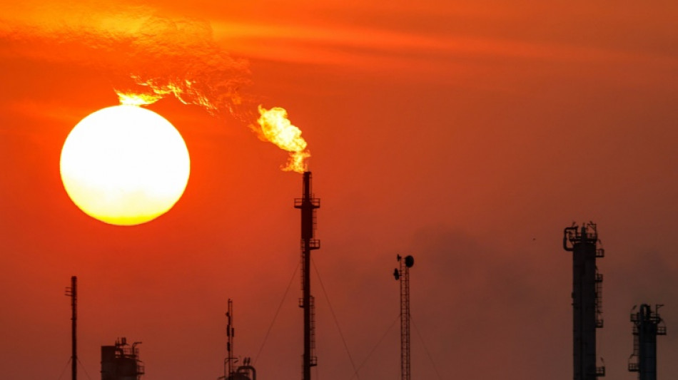 US stocks mostly rise on better inflation data while dollar retreats