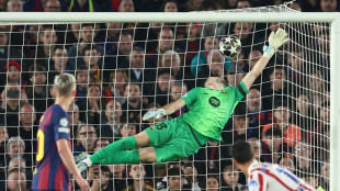 Atletico punish 10-man Barcelona, take control of Champions League tie