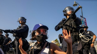 Los Angeles protests simmer as Trump and state officials clash