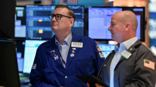 Wall Street continue de profiter de la d&eacute;tente commerciale