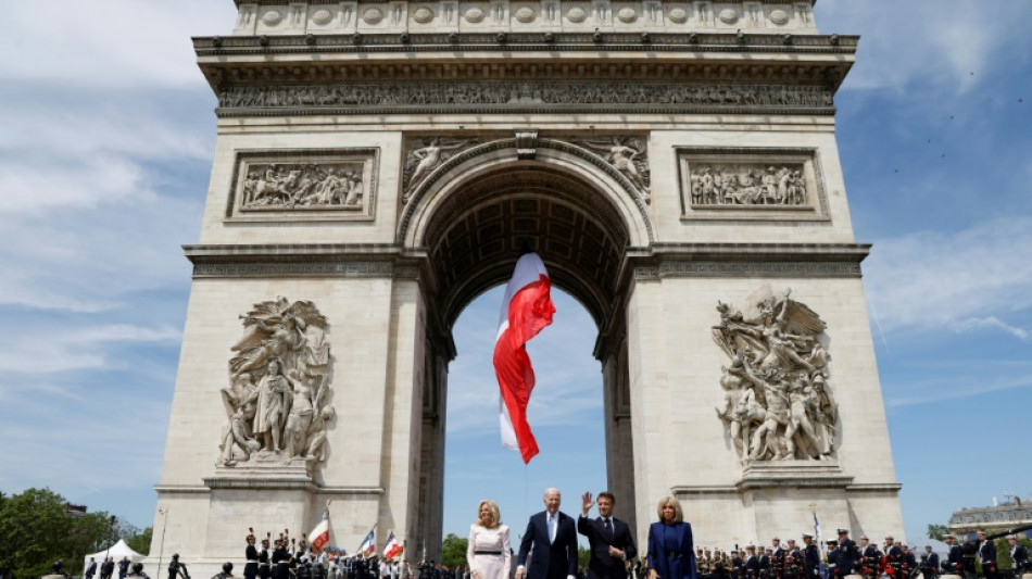 Macron welcomes Biden at Arc de Triomphe at start of state visit