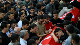 Teachers protest as Turkey buries school shooting victims