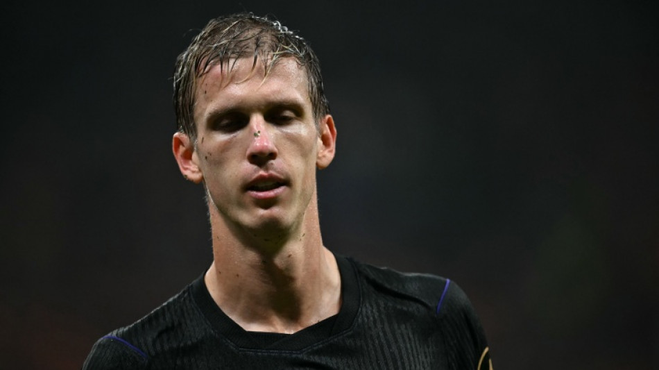 Barca's Olmo injured for a month, misses Clasico