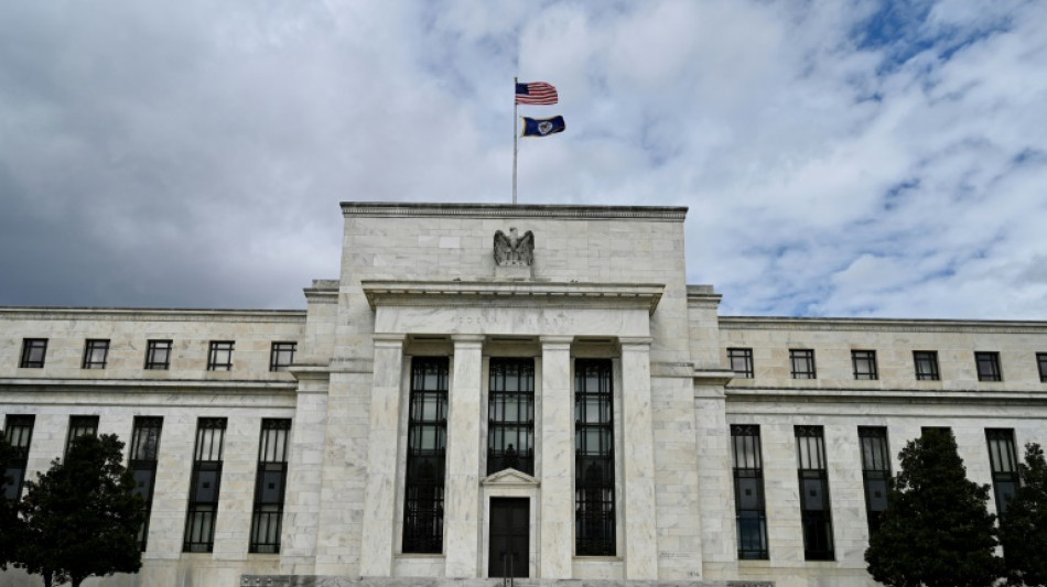 Many US Fed officials support future half-point increase: minutes