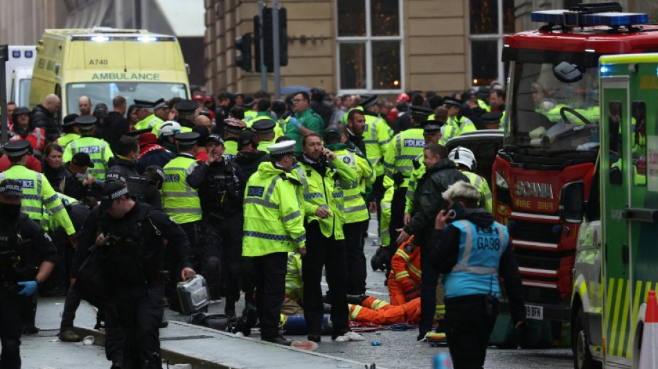 Football unites after car ploughs into Liverpool victory parade