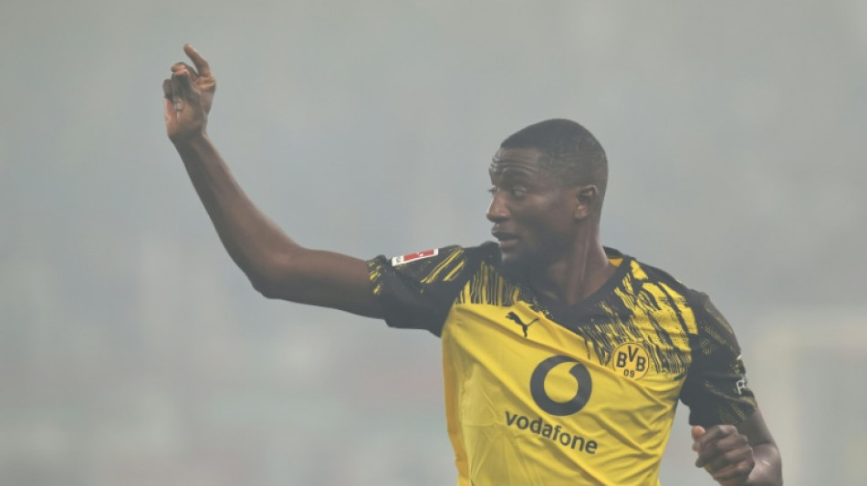 Guirassy lifts Dortmund past Augsburg ahead of Man City clash