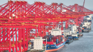 China, US to lift sweeping tariffs in trade war climbdown