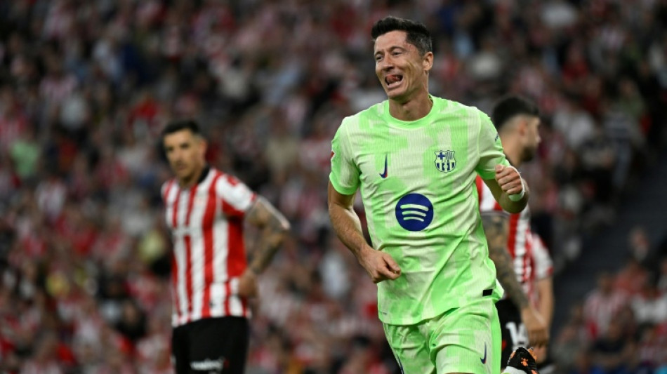 Lewandowski passes century as champions Barca sign off in style at Athletic