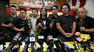 Hong Kong opposition party disbands citing 'immense' pressure