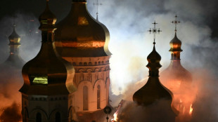 Deadly Russian strikes leave landmark Kyiv cathedral in flames