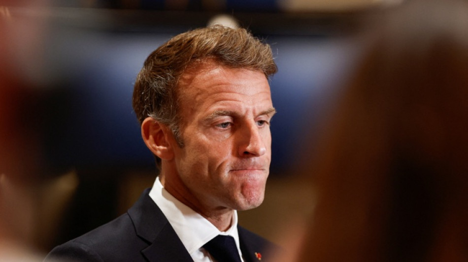 Protests banned in parts of Paris as Macron swipes at Trump 