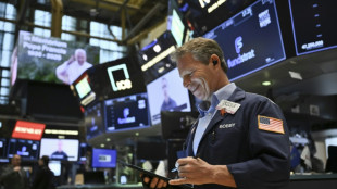 Asian markets mixed as Trump soothes Fed fears