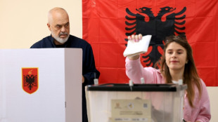 Albanians vote in election seen as key test of EU path