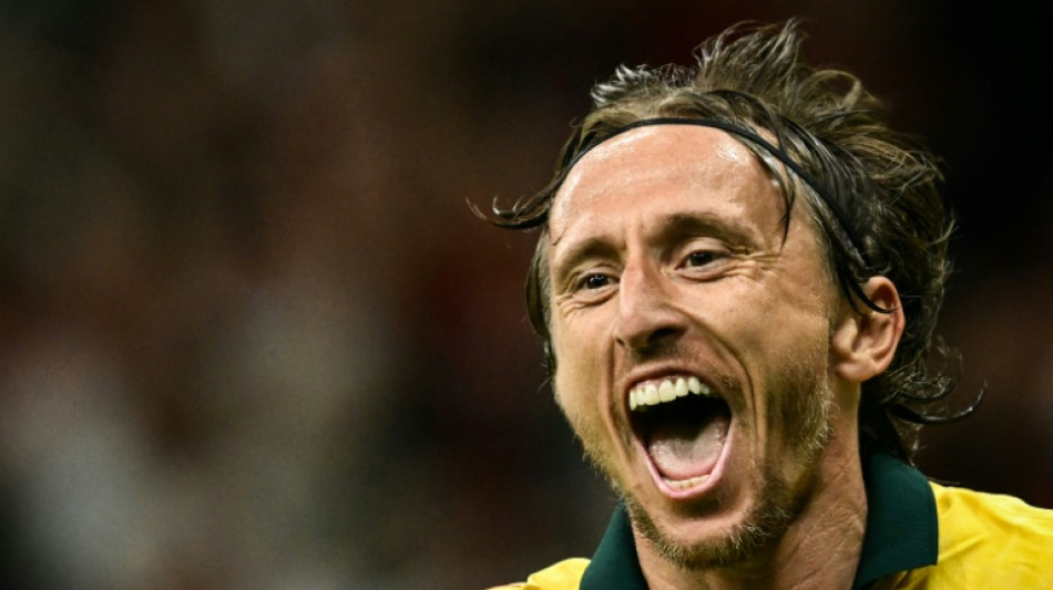 Modric opens AC Milan account with winner against Bologna