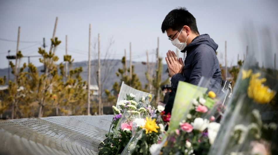 Jour de deuil au Japon, 11 ans apr&egrave;s le tsunami et l'accident nucl&eacute;aire de Fukushima