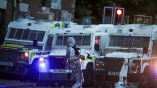 Tense standoff as N.Ireland town braces for third night of riots