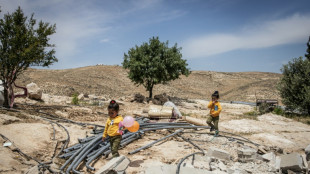 Palestinians in razed West Bank hamlet vow to stay