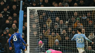 Man City title hopes hit by managerless Chelsea