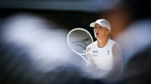 Swiatek swats Bencic aside to reach Wimbledon final against Anisimova