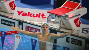 'Can't believe it': Marchand shatters long-standing world record