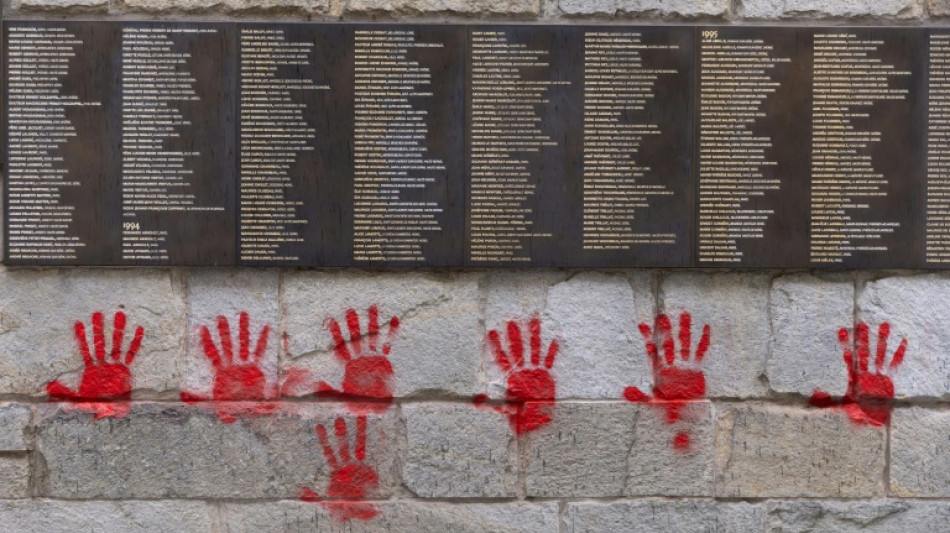 Paris Holocaust memorial hit with red hand graffiti