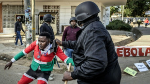 One killed as Kenyan protests at US Ebola centre turn violent