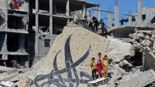 Scores killed overnight in Gaza, Israeli negotiators in Paris