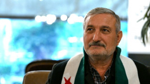 De retour &agrave; Damas, un chef rebelle se dit confiant dans l'unit&eacute; post-Assad
