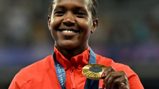 Kenya's Faith Kipyegon breaks women's 1,500m world record