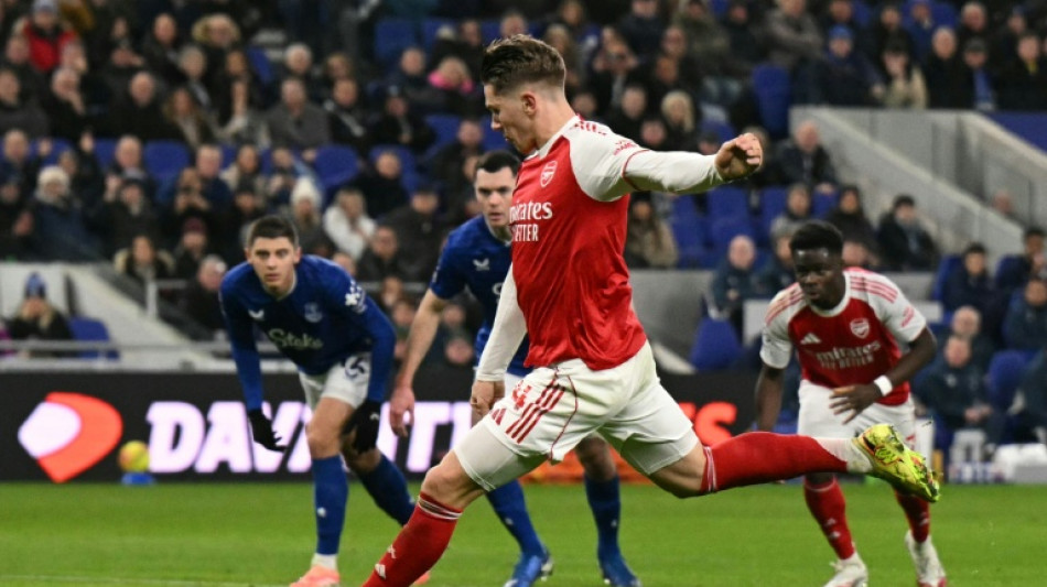 Arsenal stay top despite Man City win, Liverpool beat nine-man Spurs