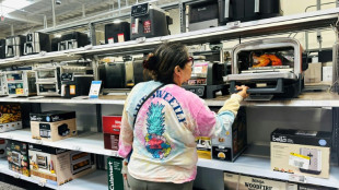 Stocks diverge, as US inflation puts focus on Trump's tariffs