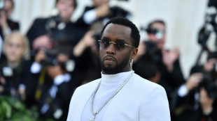 Judge scolds Sean Combs after he nods at jurors