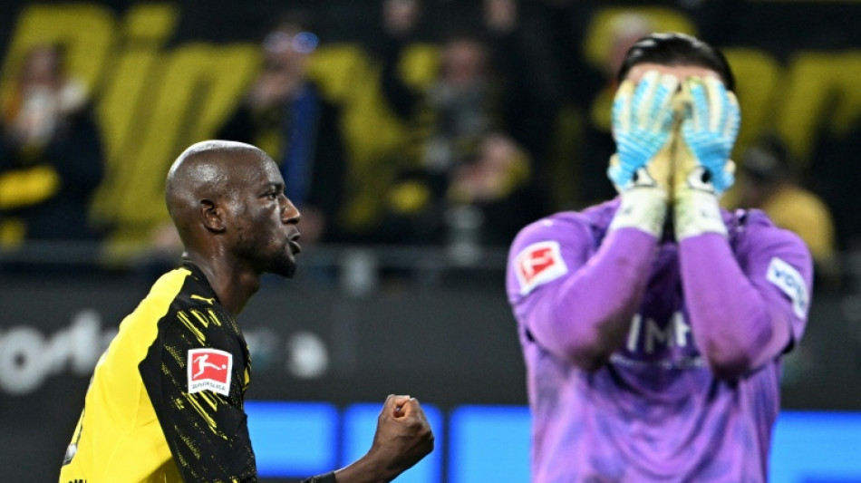 Guirassy double helps Dortmund move six points behind Bayern