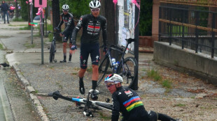 Groves wins wet Giro stage as dog unseats Evenepoel